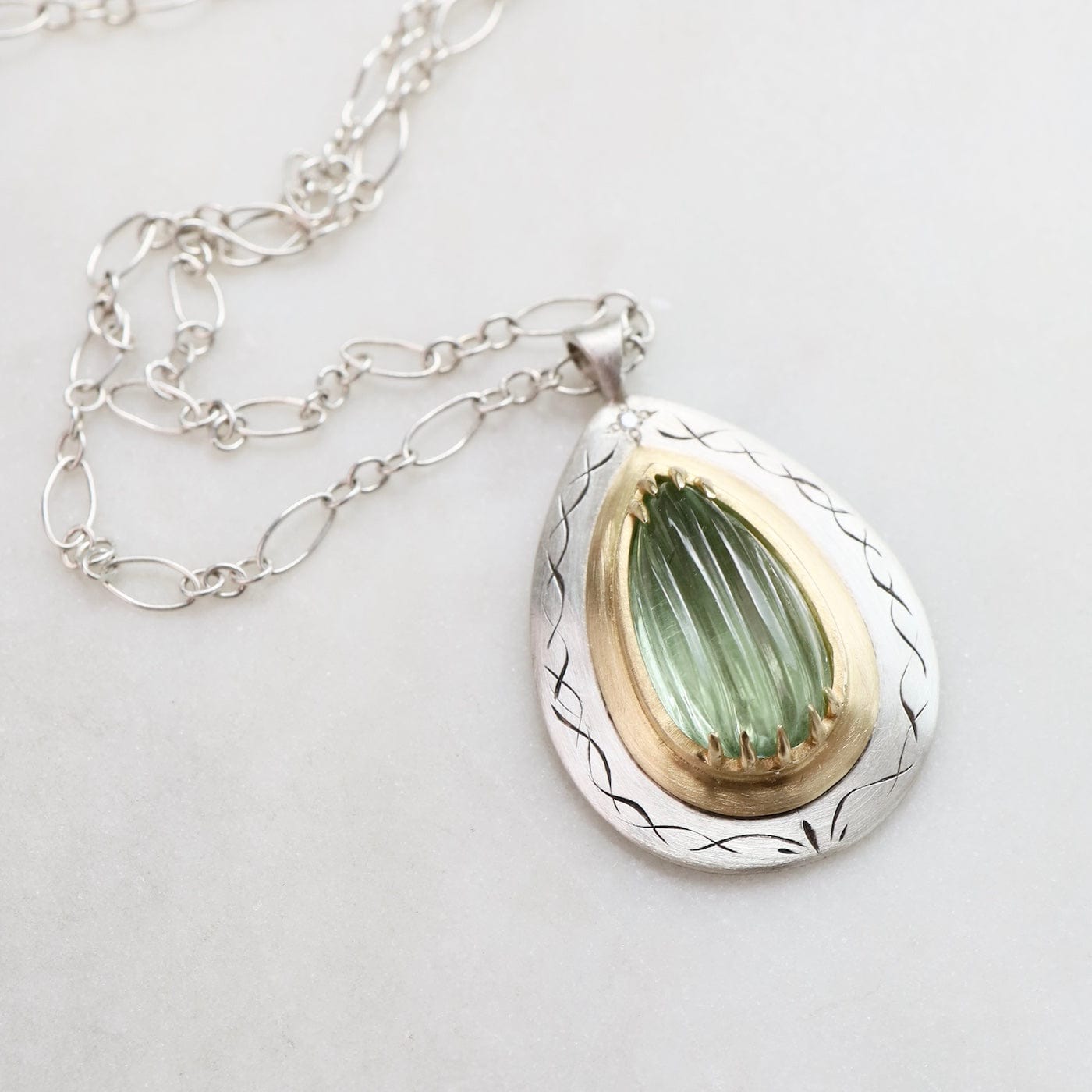NKL-18K One of a Kind Light Green Tourmaline Claw Set 18k & Sterling Silver Necklace