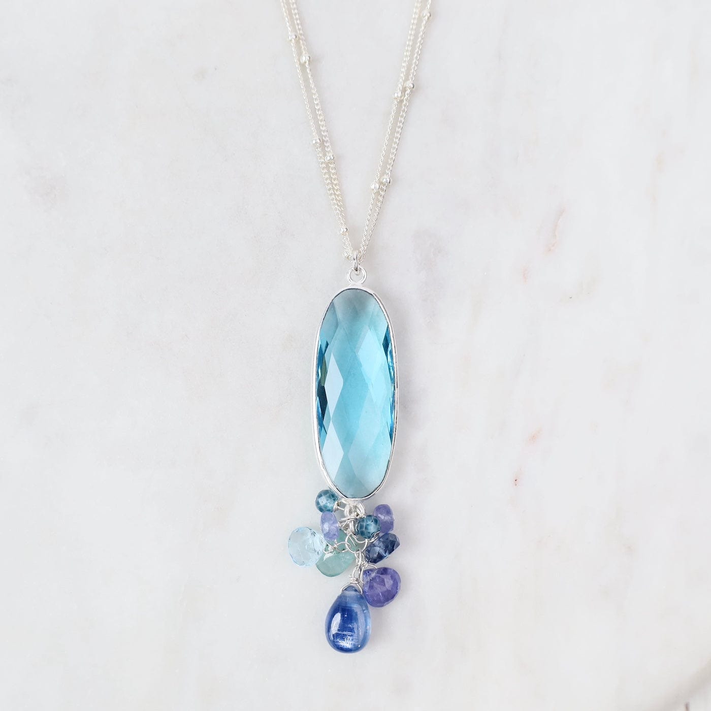 NKL Swiss Blue Topaz Oval  Silver Bezel Necklace