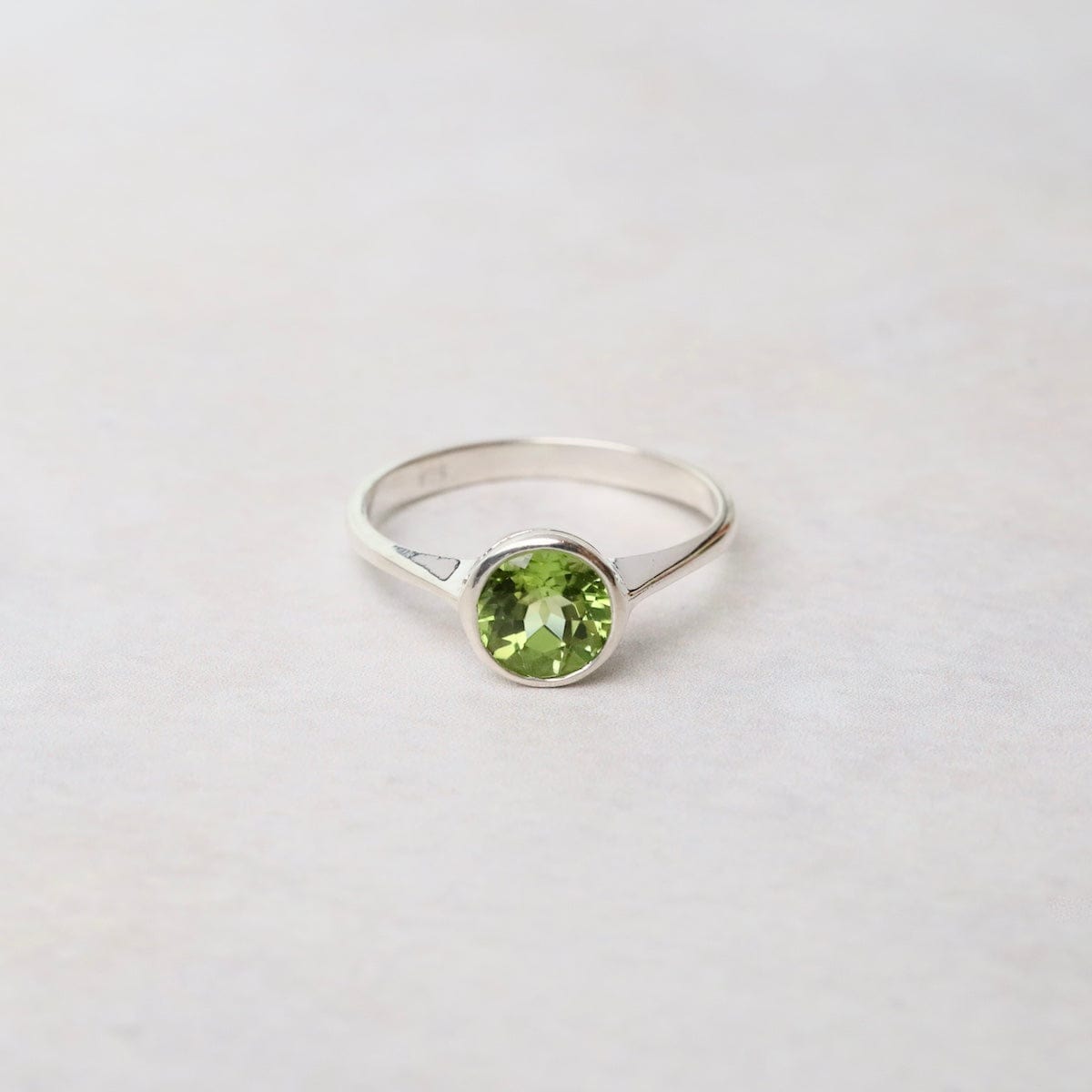 RNG Sterling Silver Ring with 6mm Round Bezel Set Peridot